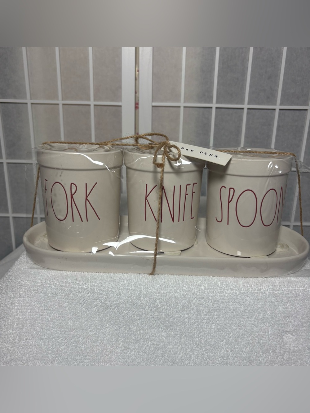 RAE DUNN-4 PC. UTENSIL SET WITH IVORY CERAMIC TRAY, SPOON, FORK, KNIFE HOLDER.